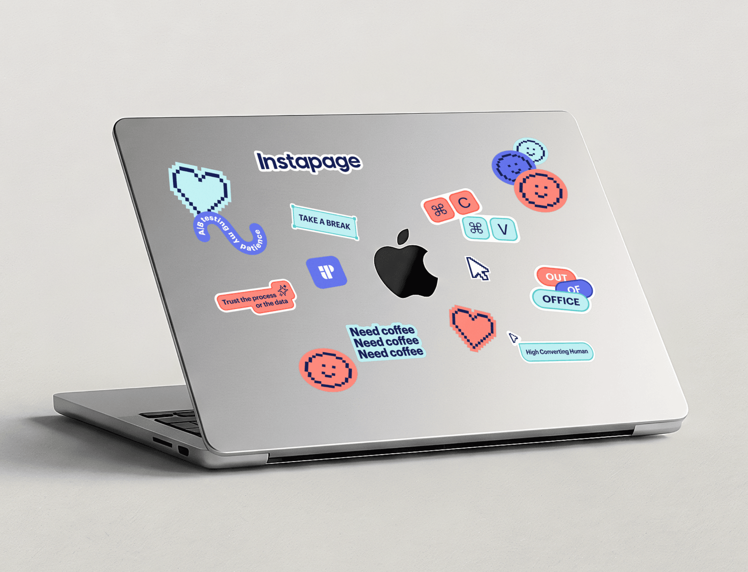 A laptop with Instapage stickers